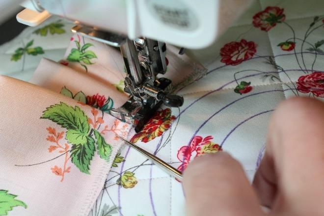 Take a couple of stitches by using a ¼ foot and placing the edge of the foot on the line of the circle. Be sure to backstitch to secure.