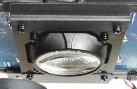 The AMF520 is a prepackaged engine containing an array of white LEDs, each with associated optics. It is capped with a fly-eye lens array and final collimating lens.