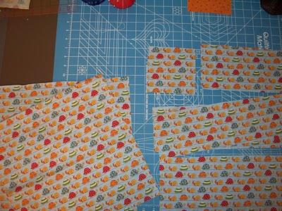 Using a 1/4" seam, sew two large nine-patch blocks with the squares you've chosen for the front and the back of the bag.