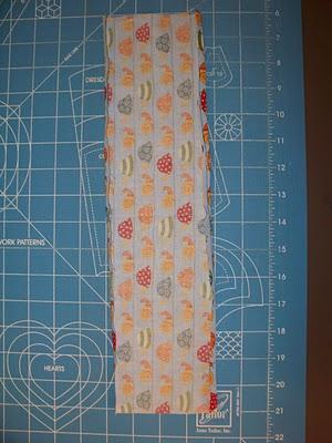 Make the same slits in the middle of the interfacing piece. 17. Each snap has a male end, a female end and two washers.