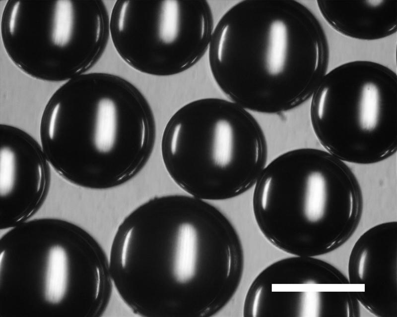 was almost sphere from the observation with the microscope. FIGURE 6 shows the frequency distribution of the diameter of the glass beads. The range of the diameter of the beads was from 430 to 570 µm.