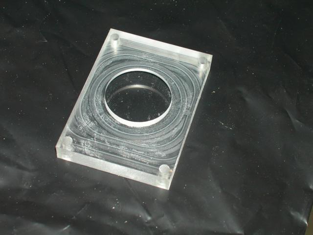 Figure 3: The lower surface of the test section is a plexiglass block. This is the surface upon which the glass particles will be deposited. 1.3 Clean the slide using a little water. 1.4 Dry the slide thoroughly.