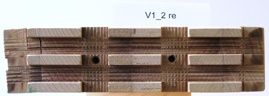 (a) Failure of specimen V1-2 in zone A. (b) Failure of specimen V1-1 in zone B. Figure 3: Failure pattern at the connection cross section of the tested transoms.