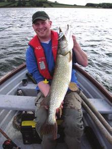Above Left: Reservoir warden Alan Dalton with a 20lb Pike he caught when fly