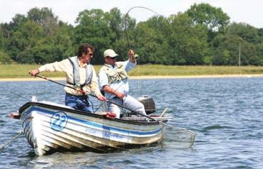 Rutland Water fly fishing instructor Dave Curly Doherty (left)