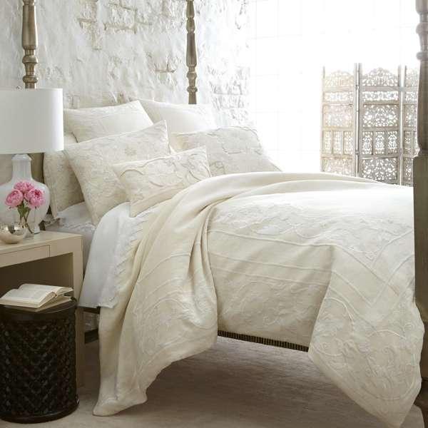 DESTINY The Destiny Bedding Collection A luxurious traditional bedding collection, handcrafted in a thick linen and embellished with velvet tonal floral accents and embroidery; the whimsical and