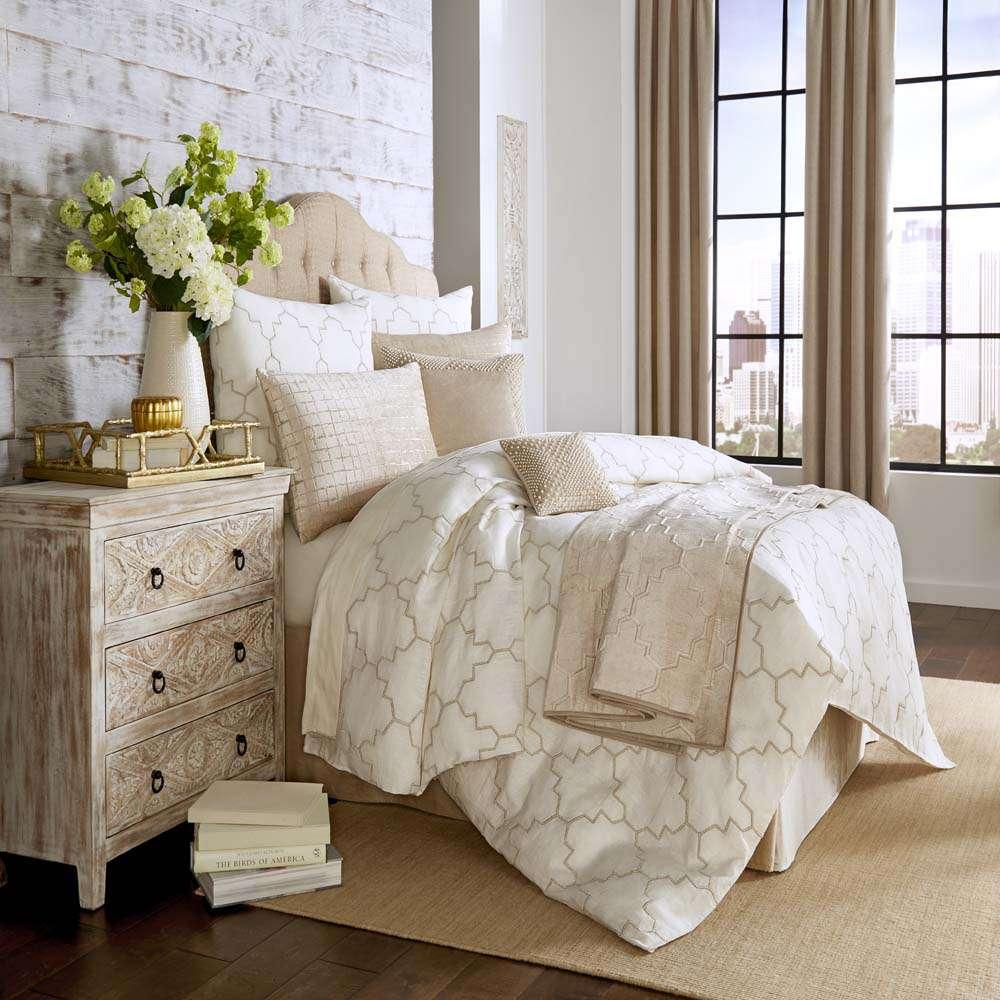 TORLONIA The Torlonia Bedding Collection A refreshingly contemporary bedding ensemble that has been handcrafted in a fine linen and embroidered with cord and metallic details, finished with