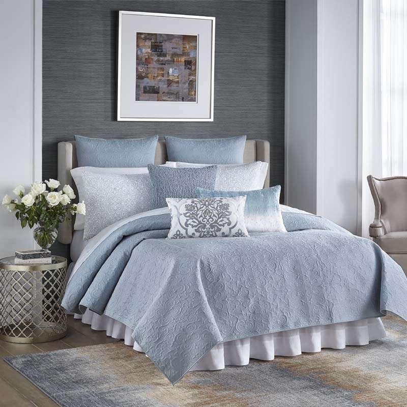 ESSEX The Essex Bedding Collection An exquisite Renaissance styled bedding ensemble, crafted in our finest cotton sateen textile and displayed in an ocean blue color; this quilt collection is