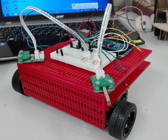 control programs and circuits for this robot and learn the basics of system integration. a box, boxes are up and drops the baggage to their own field.