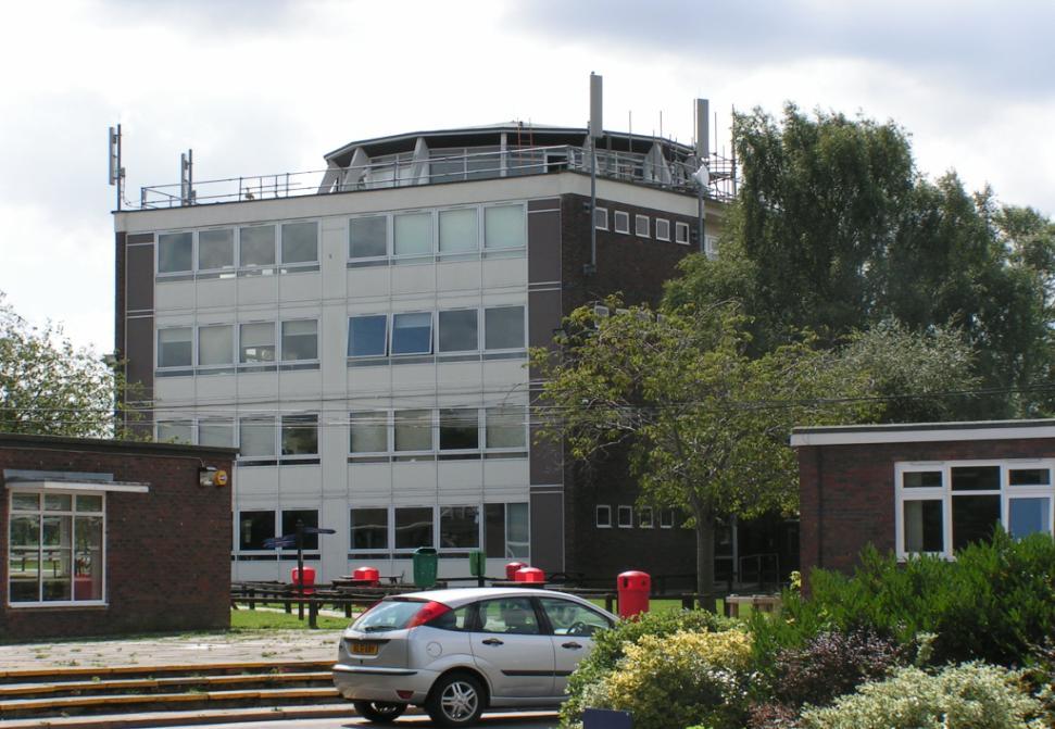 Mobile Phone Base-Station Audit Audit site: Mandeville School Aylesbury Buckinghamshire HP2 8ES (no photo) The Office of Communications (Ofcom) is responsible for management of the civil radio