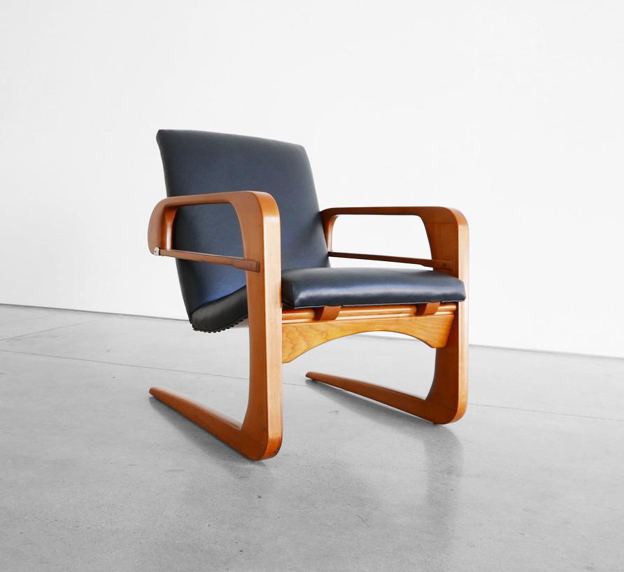 KEM WEBER AIRLINE ARMCHAIR, C. 1935 BEECH, LEATHER, STEEL 32 H x 24.75 W x 29 D inches This iconic original Airline chair was designed by KEM Weber in 1935.