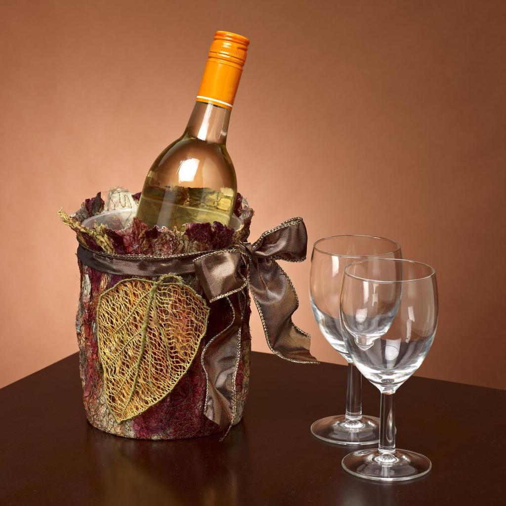 Holiday Ice Bucket Do you love holiday decorating? Give every inch of your house a festive touch with MasterWorks III by Designer s Gallery.