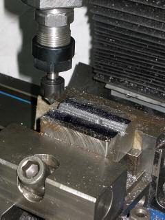 Since the V-block can be moved up and down in the vice it can cope with work of various diameters.