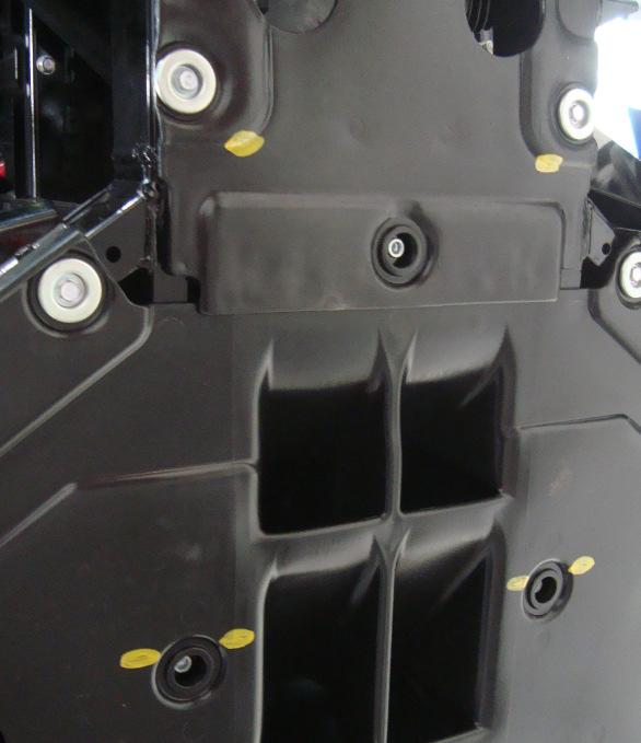 Align the three holes in the mount plate (item #1) with the removed screw locations for the plastic skid plate as shown.