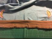 Attaching waistband. Right sides together, with the raw ends meeting.