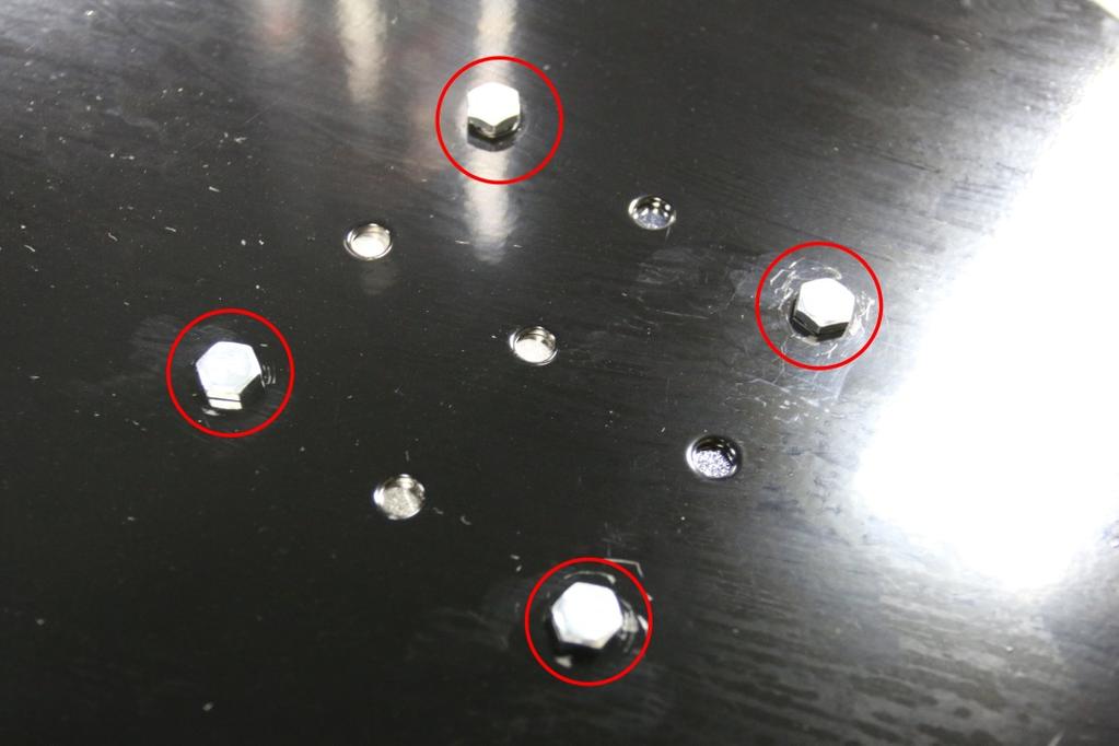 the 4x Small Bolts in these 4 holes Tighten
