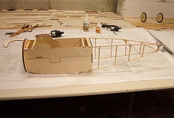 FUSELAGE CONSTRUCTION The fuselage is built as two separate box structures, the front balsa sheet and ply area and the rear built up section, which are then joined over the plan.