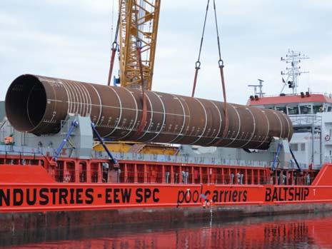 WTG Foundations > Foundation installation is underway in Liverpool Bay. > Foundations consist of a steel monopile between 60 70 metres long and 6-7 metres wide and a yellow transition piece.