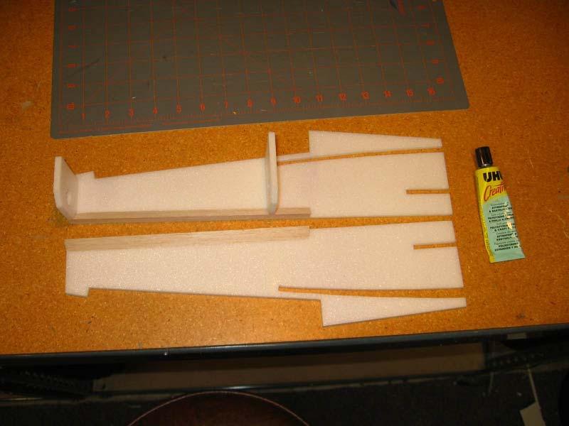 Glue the bulkheads and balsa triangle stock to the forward fuselage sides.