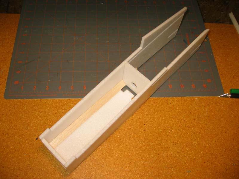 Glue the two forward fuselage sides together, then