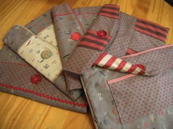 wonderful buttons, piping, ric-rac, and a variety of trims, some with slip-in pockets, some with zippered pockets, each