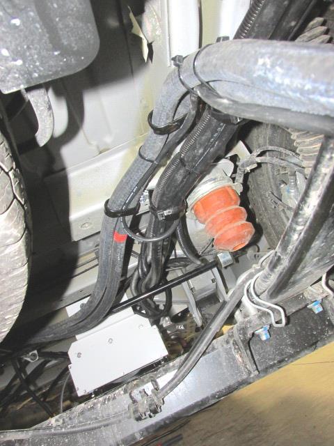 68 68. Secure the Red/Black heater hoses & wire harness with (6) 02 000 052 tie-wraps as shown.