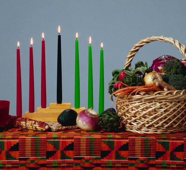 During Kwanzaa, people celebrate by eating together and giving gifts. An mkeka, or mat, with vegetables is put in the home. Special items are placed on this mat.
