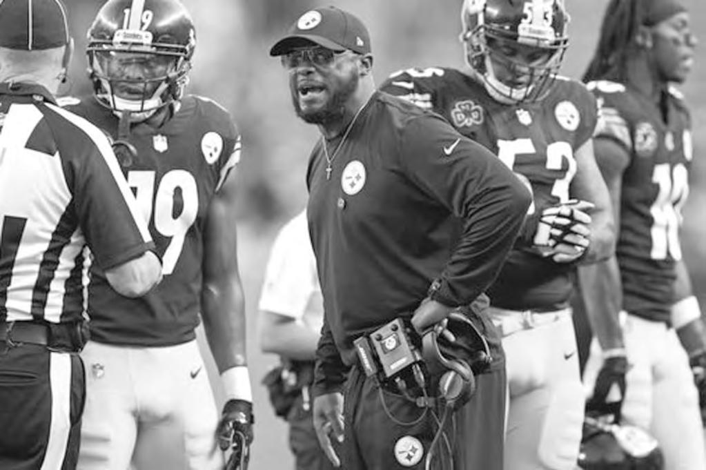 Tomlin was the only other coach named on all 11 ballots in voting by an Associated Press panel for the top NFL coaches, and finished second with 81 points.