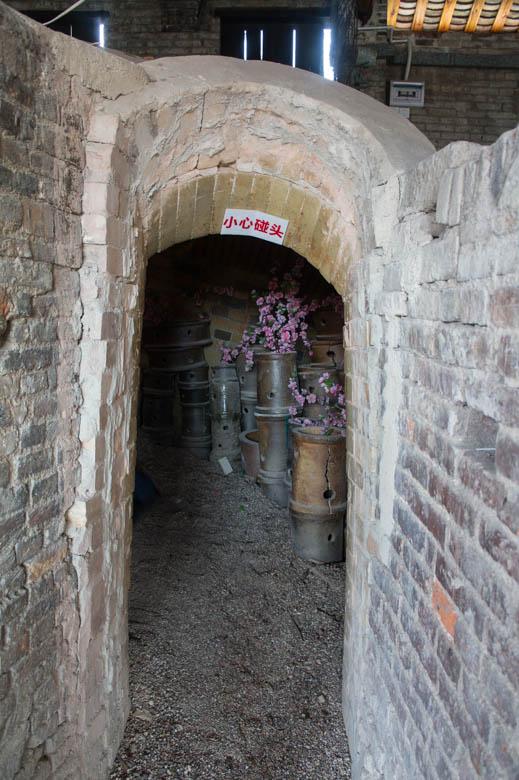 Further up the kiln is another side entrance where visitors can walk into the tunnel and view the inside of the kiln.