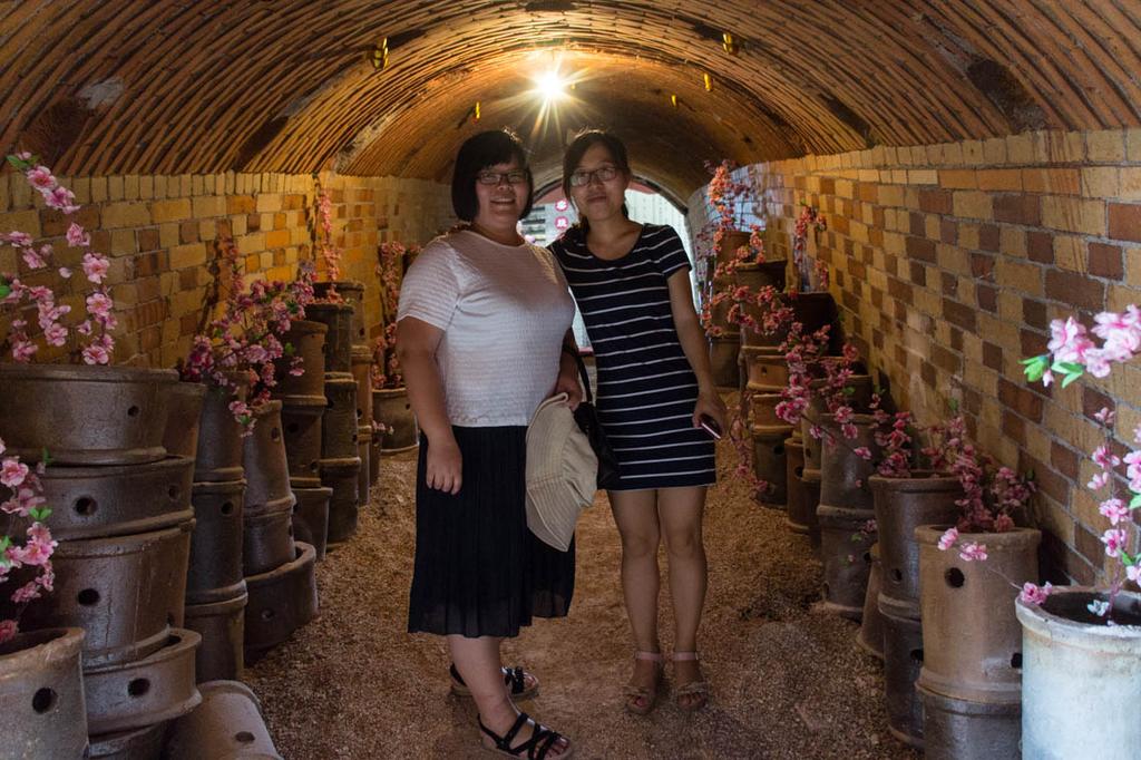 This photo of Chen Chen and Johana standing inside the kiln tunnel gives a real sense of just how large these dragon kilns are.