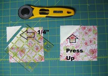 Once again, place a marked cream square onto the other side of the floral 4½" square with right sides together