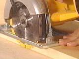 Steps: Adjust the depth of the saw blade to just cut into the surface of a scrap piece of wood Cut along the measured line Measure the two sidepieces to 13 9/16" along one edge and 16" along the