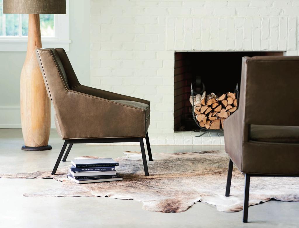 The Amani chair is showcased here in leather with the charcoal base.