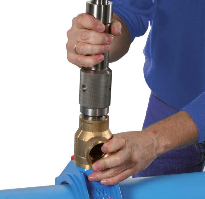 - screw the EWE-tapping device in the tapping fitting - fix it with