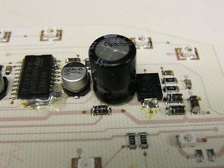 be done with the key ON!)What is happening is that the top side of the feed through does not have any solder on the feed paths on the top of the board.