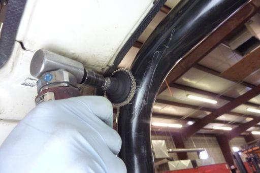 Step 17 Remove the paint from the existing roll bar using an