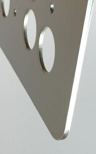 Detail: Cuts as fine as the laser beam width are possible; as low as 0.012, depending on material thickness; see Photo 4: 0.
