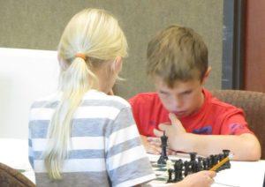 able to compete on this day A moment of concentration in a chess game It was a long afternoon of chess competition