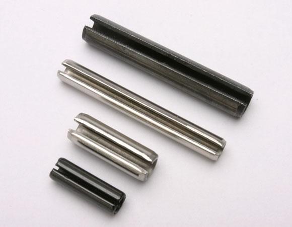 SLOTTED SPRING PINS (SPRING TENSION PINS) Slotted Spring Pins consist of a single coil of spring steel (or stainless steel) with an open slot sufficiently wide to enable the pin to reduce in diameter
