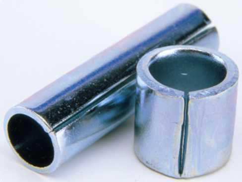 There are two types: - Spacer Under Compression Clearance Spacers, which are fastened with a nut and bolt, and where the inside diameter of the spacer is slightly larger than the bolt diameter