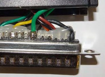 Then carefully pull out the connector to expose the pins.