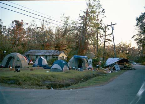 Temporary Housing Until With their Mobile home in the street,