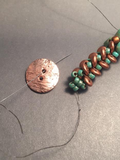 Add two beads, circling through the original two beads, exiting