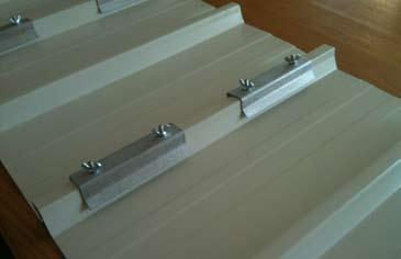 za Solar panel brackets: This bracket was recently developed to secure solar panels onto the Novotexi 440 roof sheets