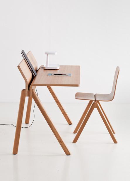 Plywood Desk, which includes a support for open books and notepads.