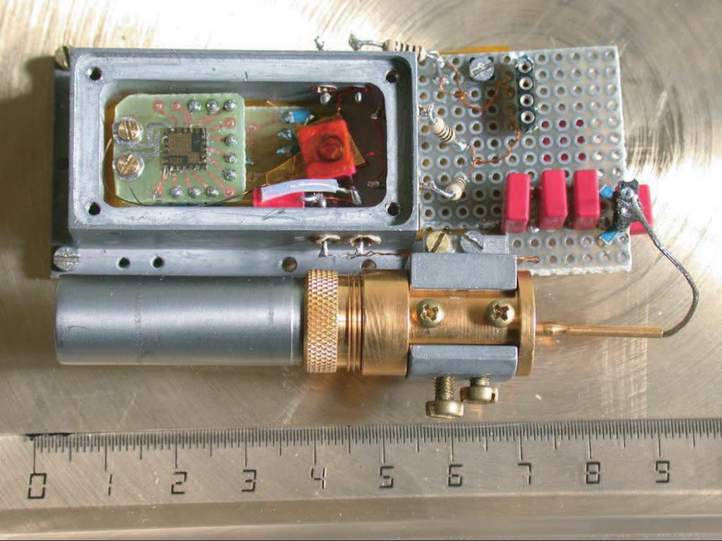 A double-gap transducer has already been designed, assembled and tested at liquid helium temperatures.