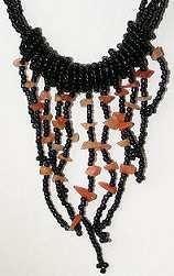 Very unusual pendant made from cut shell set in resin. On a multi strand Black thong necklace. 7.50 each pk 3 rrp 5.