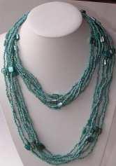 6 SHELL JEWELLERY 962 Long Bead & Shell Pieces Necklace. 100mm long elegant Turquoise & Natural 7 strand bead necklace with shell pieces inserts.