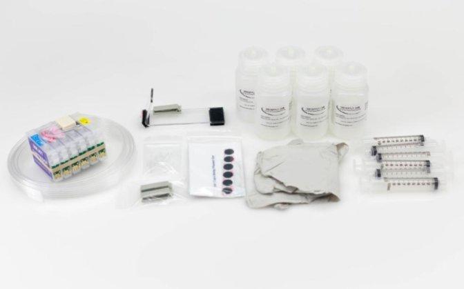 The CFS kit contains: 1x 1x 1x 2x Empty CFS cartridges with tubes. Acrylic Bridge Bracket. Pair gloves.