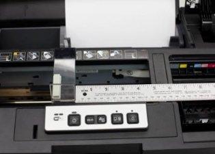 75" from the left edge of the cross member on the top of the printer as shown in